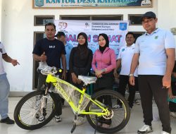 Meriahkan HUT ke-59 Tahun, Libatkan Ribuan Peserta Pemdes Kayangan Helat Jalan Sehat