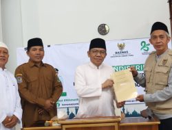 Bupati Najmul Akhyar Hadiri Penyaluran ZIS Baznas KLU di Masjid Baiturrahim.