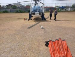Helikopter Polri Gempur Api TPA Putri Cempo