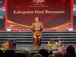 Angkat Wastra Sumsel ke Panggung Nasional: Tampil di Fashion Show Kriyanusa 2026, Hj Patimah Toha Kenakan Gambo Oranye